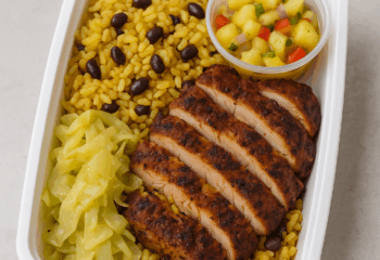 Jerk Chicken with Yellow Rice & Beans, Cabbage & Pineapple Salsa